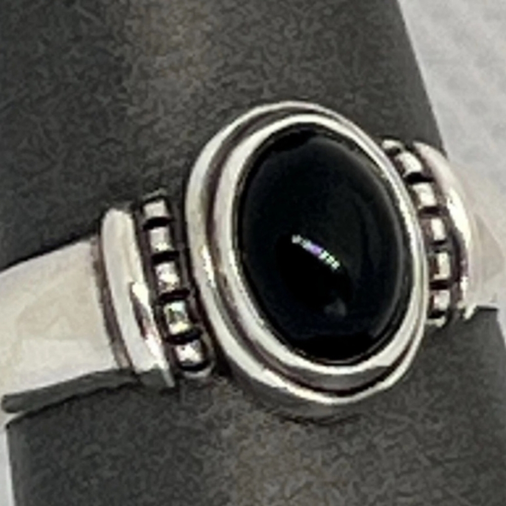Retired James Avery Sophisticated Silver and Black Onyx Ring with Ornate Design